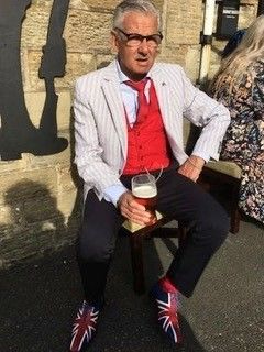 The ever dapper Ed enjoying a well earned post lockdown pint !
