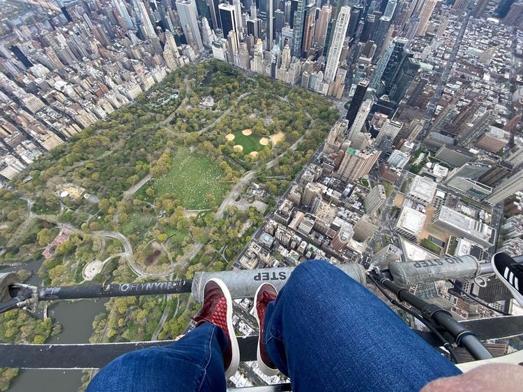 Mr Simon James flying high over Central Park New York