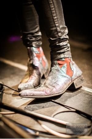 Luke from the Struts on stage in his Battered Flashing Snake Dragon's, strike a pose there's nothing