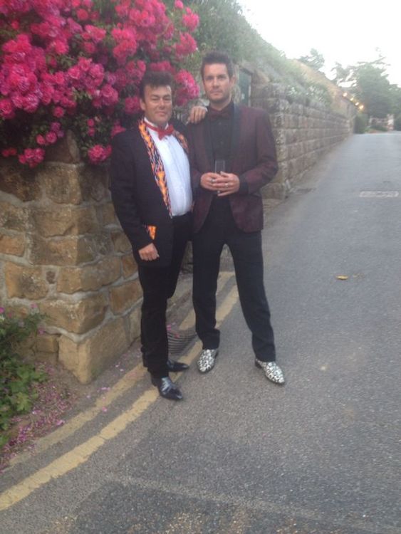 Jamie Poulton and Steve Lewis dressed for antics  at the Point to Point Summer Ball.