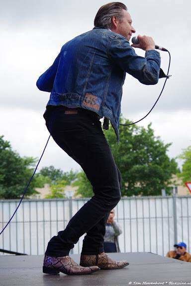 Marcel Duprix performing on stage with his band Mojo Man, in the Rochester Natural Snake boots!