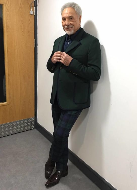 Whats new pussycat? Mr. Jones looking extremely cool in his green felt jacket, black watch tartan tr